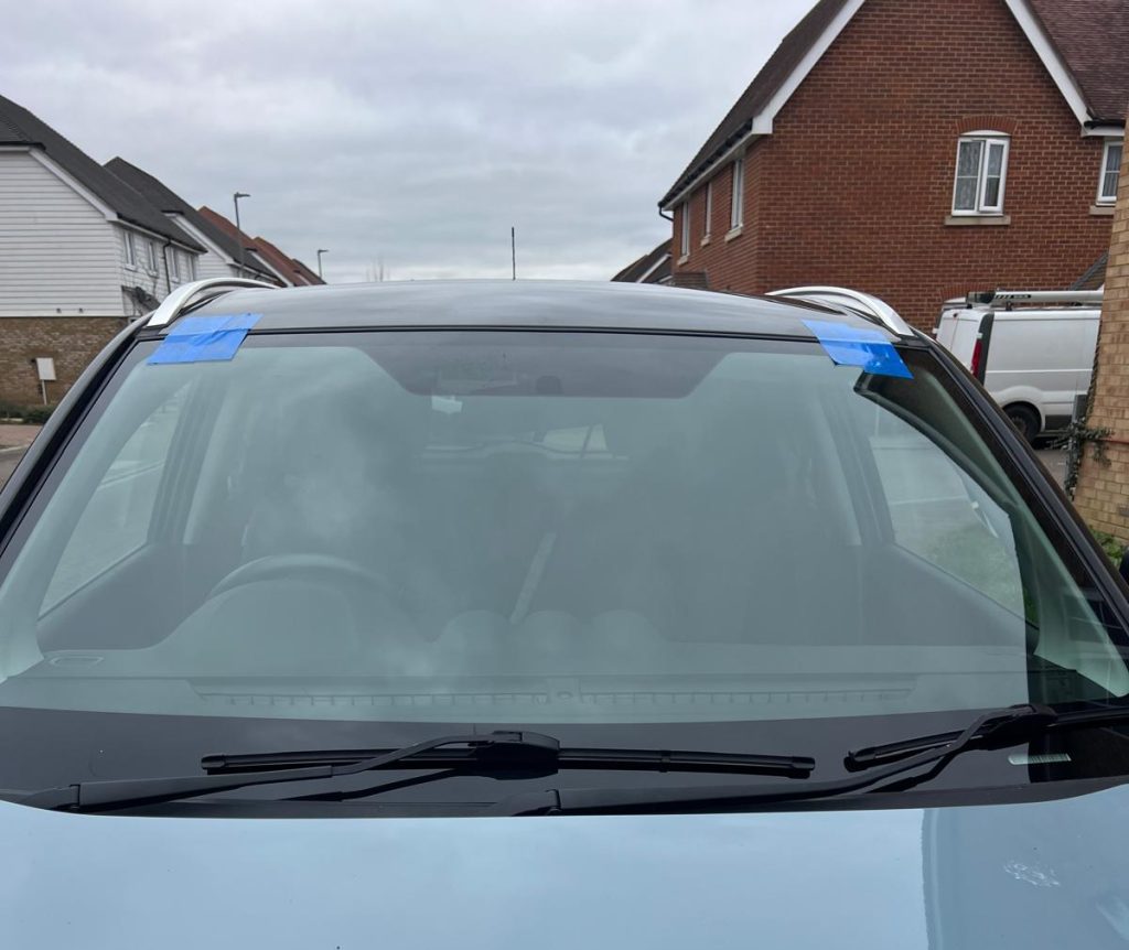 windscreen being replaced on a family estate car in dartford